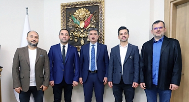 TSYD İzmir Şubesi, Gençlik ve Spor İl Müdürü Murat Eskici'yi ziyaret etti